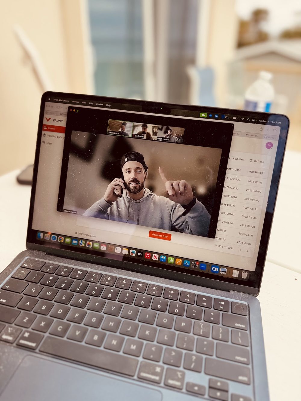 A live video sales call on a rep's laptop