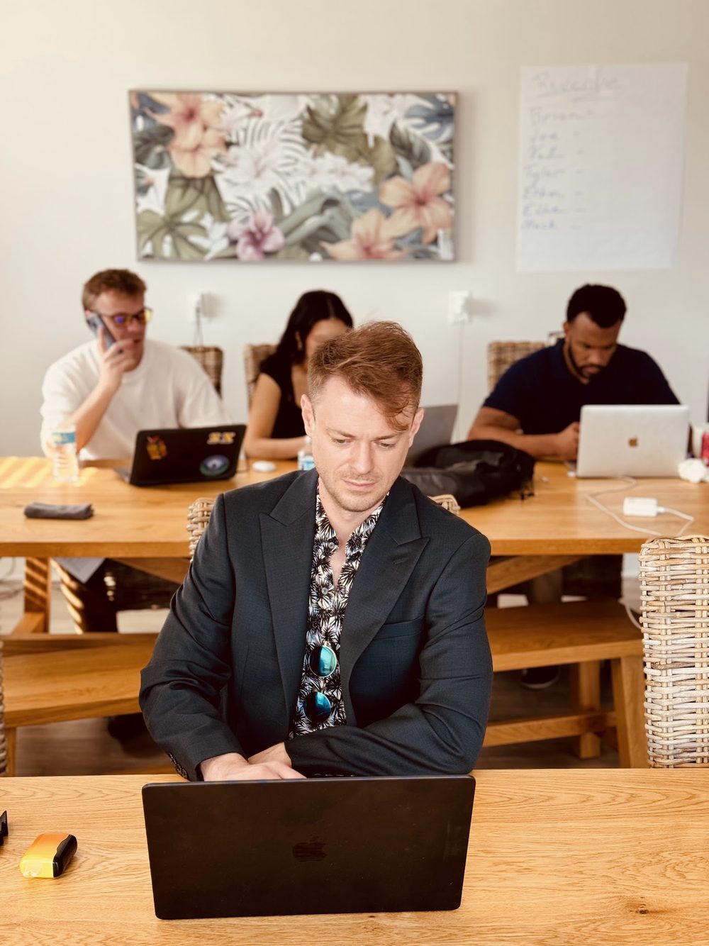 A Button Up rep running calls from the laptop
